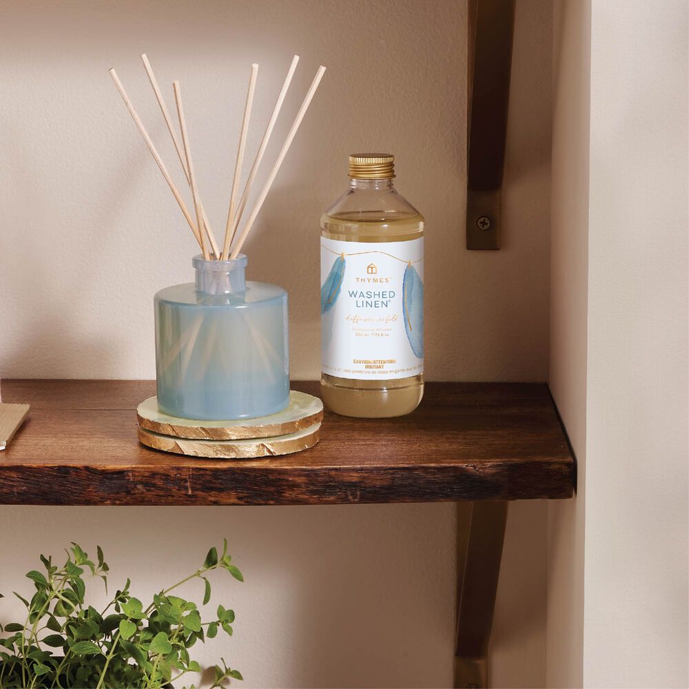 Washed Linen Reed Diffuser Refill & petite diffuser on a shelf image number 1